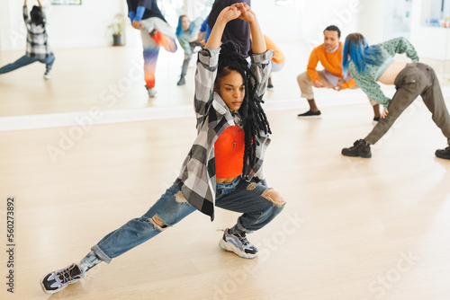 Image of african american female hip hop dancer practicing at dance studio