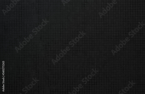 Black tile high resolution real photo. Brick seamless pattern texture square floor ceramic tiles interior room background.
