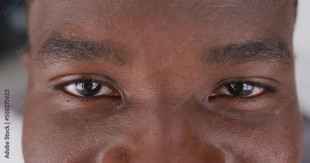 Video close up portrait of the eyes of african american man smiling Video close up portrait of the eyes of african american man smiling