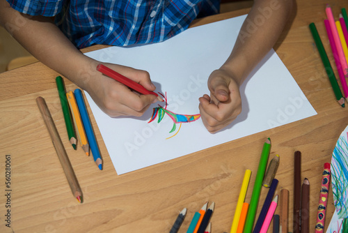Close-up of a boy's hand colouring, Munich, Germany