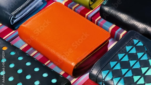 Wallpaper Mural Leather wallets are on the showcase of an accessories store. Closeup Torontodigital.ca