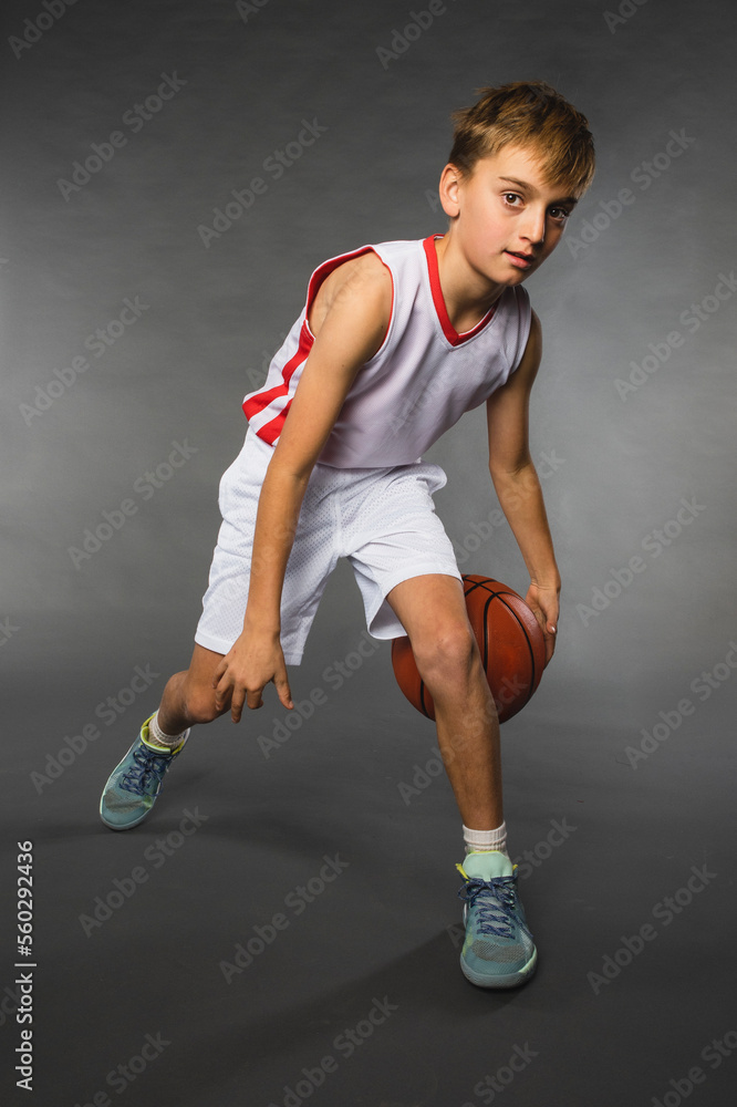 Young Boy Basketball Player in Studio