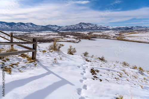 Winter Mountain Park - A bright sunny Winter day view of a snow-covered hiking trail, overlooking Bear Creek Lake Park, at side of Mt. Carbon. Denver-Lakewood-Morrison, Colorado, USA. © Sean Xu