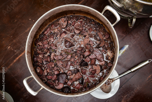 brazilian cuisine feijoada, carioca bean stew, brazilian feijoada food, top view, seen from above,traditional feijoada,traditional feijoada in the pan,top view,brazilian food,food background,feijoada  photo