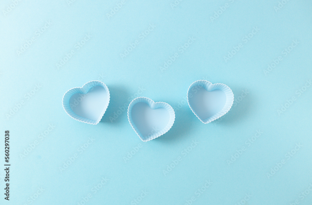Three shapes for a muffin heart on a blue background.