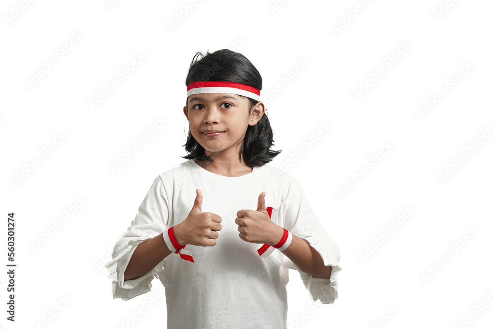 Asian girl child indonesian independence concept, giving approval sign with thumbs up. Isolated by white background. Asian girl child indonesian independence concept, giving approval sign with thumbs up. Isolated by white background.