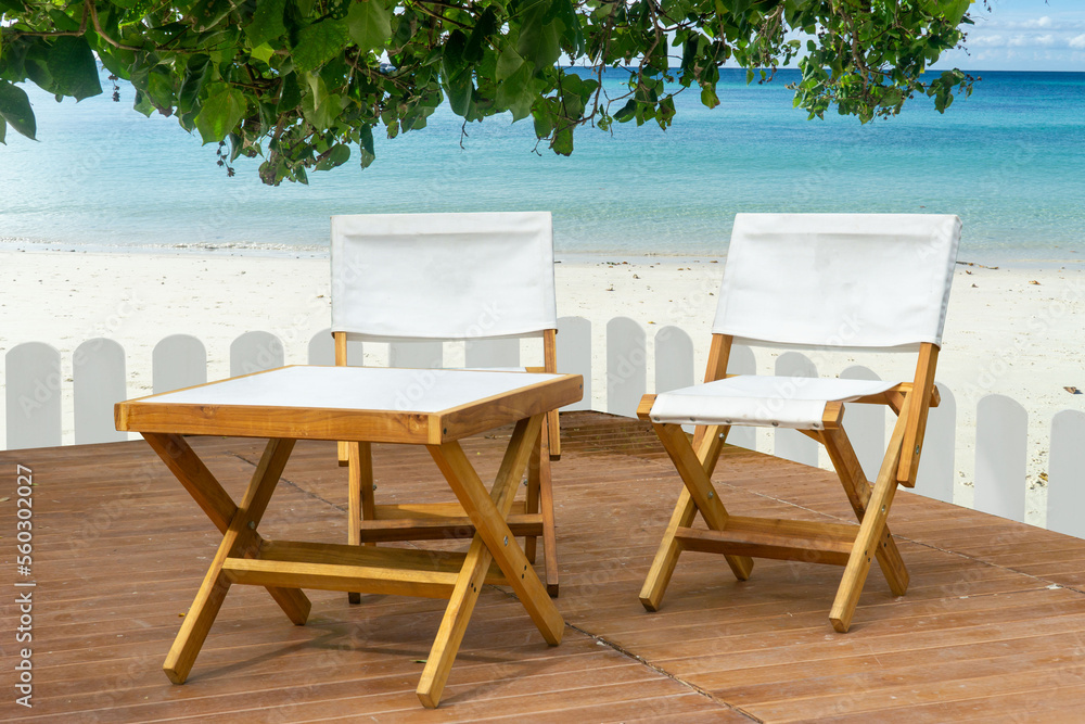 Obraz premium Outdoor wooden Table set with Field Tents group in the Camping area at Natural Parkland and river views background
