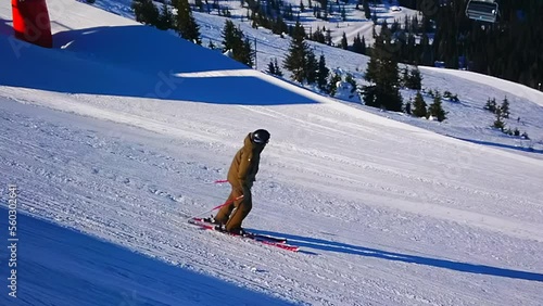 Skiing in slow motion, Schmittenhohe Mount, Zell am See, Austria photo