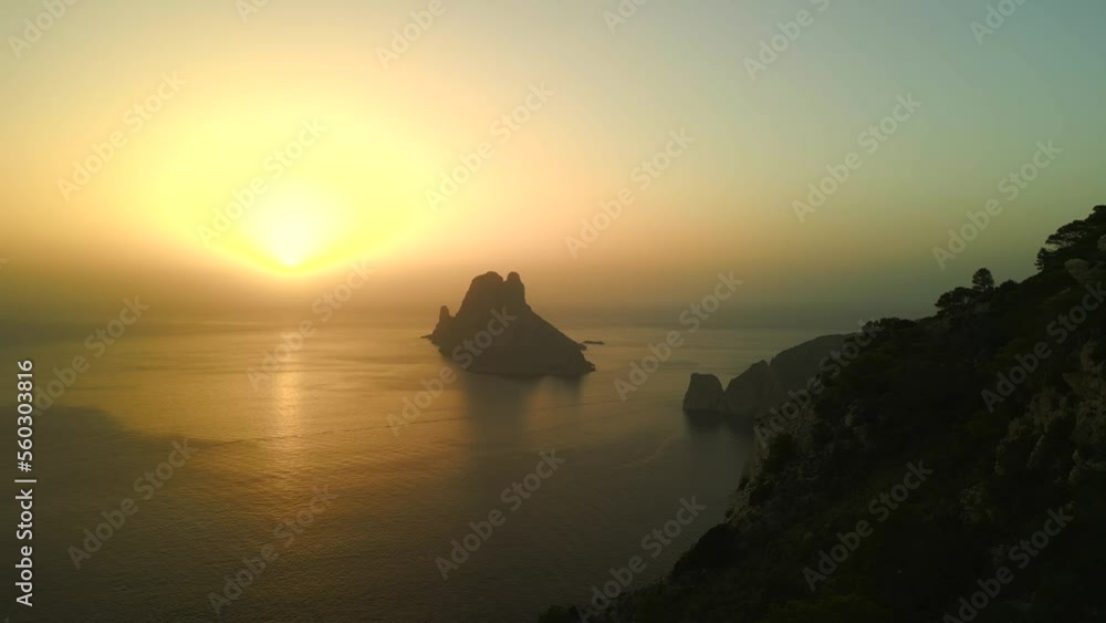 Ibiza es vedra island sunset. Beautiful aerial view flight panorama overview drone, autumn 2022. High Quality 4k Cinematic footage Ibiza es vedra island sunset. Beautiful aerial view flight panorama overview drone, autumn 2022. High Quality 4k Cinematic footage
