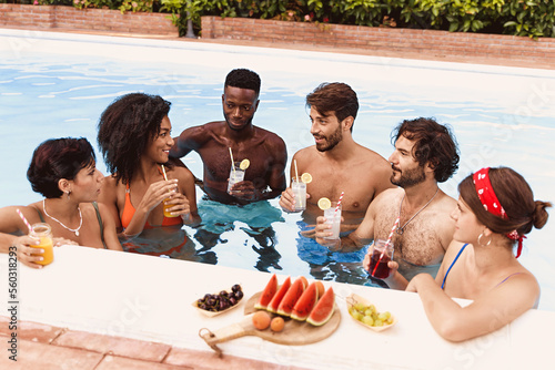 Canvas Print Diverse Multicultural Young Adult Friends Enjoying a Summer Pool Party
