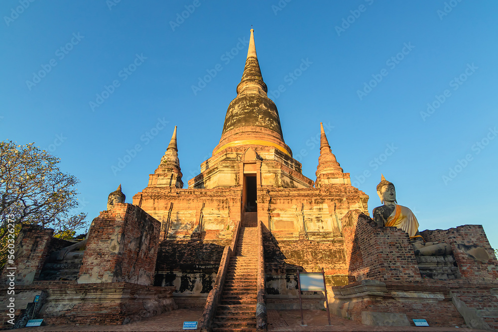 Buddha statues in front of Pagoda at Wat Yai Chai Mongkhon, Ayutthaya, Thailand, Unesco World Heritage Site.