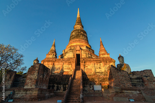 Buddha statues in front of Pagoda at Wat Yai Chai Mongkhon  Ayutthaya  Thailand  Unesco World Heritage Site.