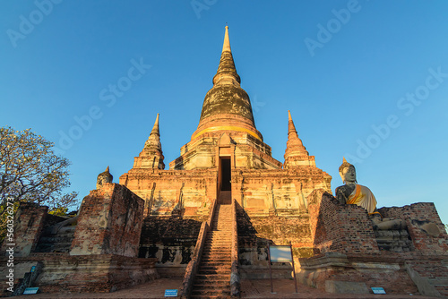 Buddha statues in front of Pagoda at Wat Yai Chai Mongkhon  Ayutthaya  Thailand  Unesco World Heritage Site.