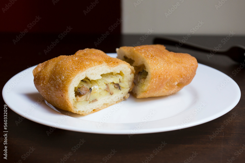 Pirozhki are stuffed rolls typical of Russian, Belarusian, and Ukrainian cuisines. They can be baked or fried with yeast. Their fillings are made of meat or vegetables. Pirozhki are stuffed rolls typical of Russian, Belarusian, and Ukrainian cuisines. They can be baked or fried with yeast. Their fillings are made of meat or vegetables.