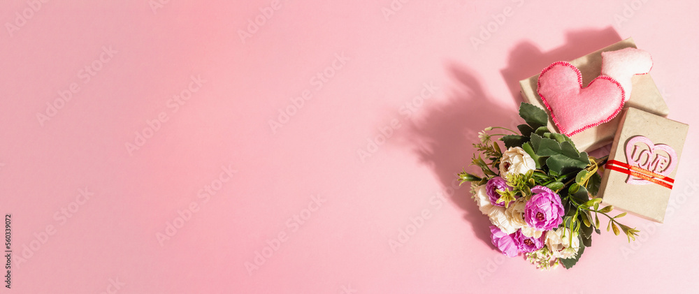 Fototapeta premium Spring gift set. Present box, flowers bouquet, festive decor. Valentines or Mother's Day