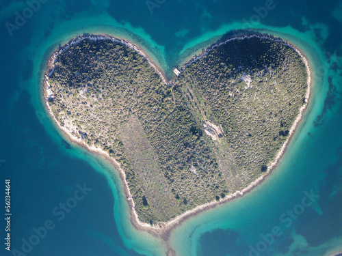 Aerial drone view of Galesnjak the Island of Love in Croatia with beautiful blue turquoise sea water. Heart shaped Island. Travel and holidays destination. Amazing tourism in Croatia Islands. 