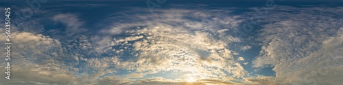 Fototapeta Naklejka Na Ścianę i Meble -  Dark blue sunset sky panorama with golden Cumulus clouds. Seamle