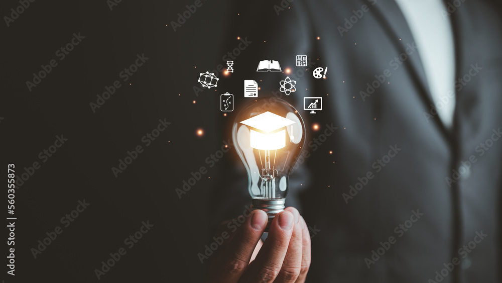 E-learning graduate certificate program concept. man holding lightbulb showing graduation hat, Internet education course degree, study knowledge to creative thinking idea and problem solving solution - obrazy, fototapety, plakaty 