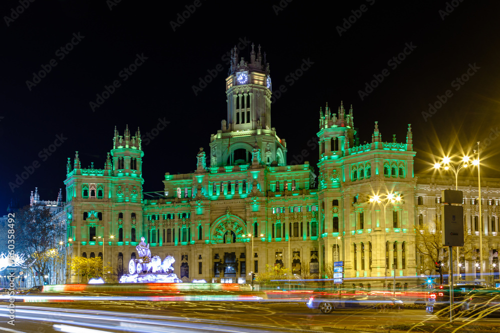 town hall and plaza de cibeles at night illuminated in green