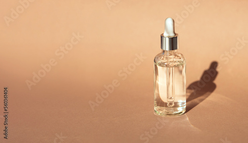 serum on a beige background with natural light