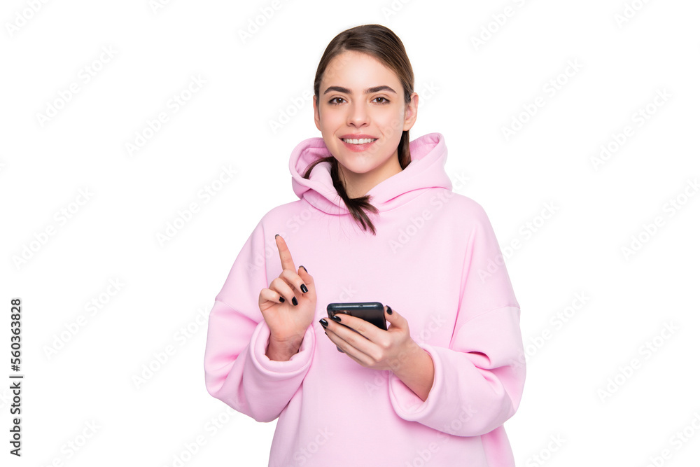 Happy woman pointing finger up holding mobile phone isolated on white copy space, advertise Happy woman pointing finger up holding mobile phone isolated on white copy space, advertise