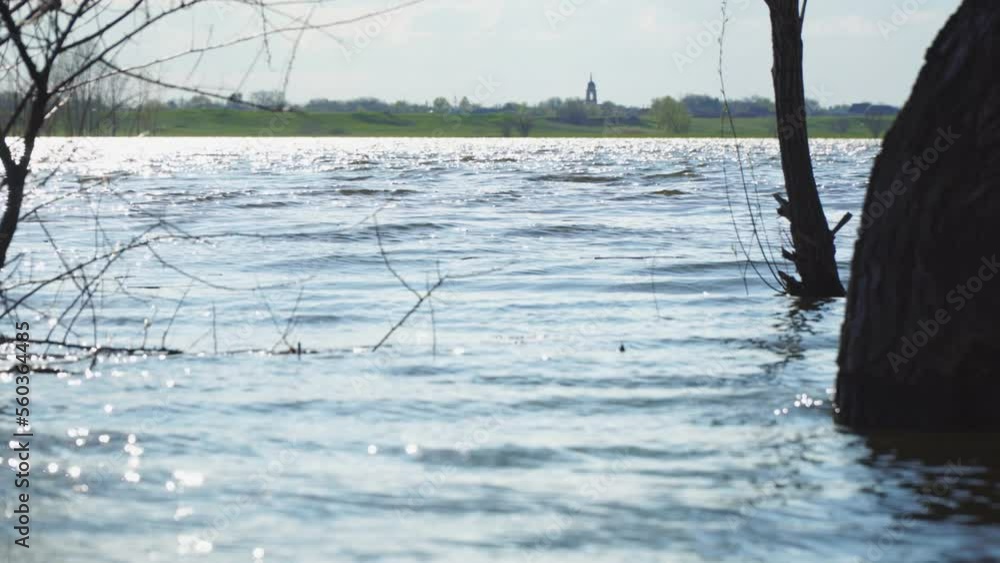 High water on a river or lake during the spring flood High water on a river or lake during the spring flood