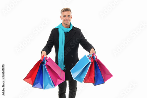 selective focus of shopping man with purchase. shopping man with purchase isolated on white.