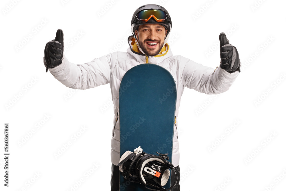 Young man with a snowboard gesturing with both thumbs up