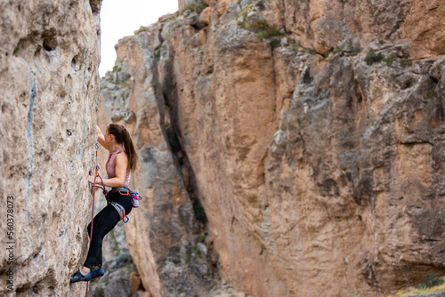 girl rock climber. sport climbing. © zhukovvvlad