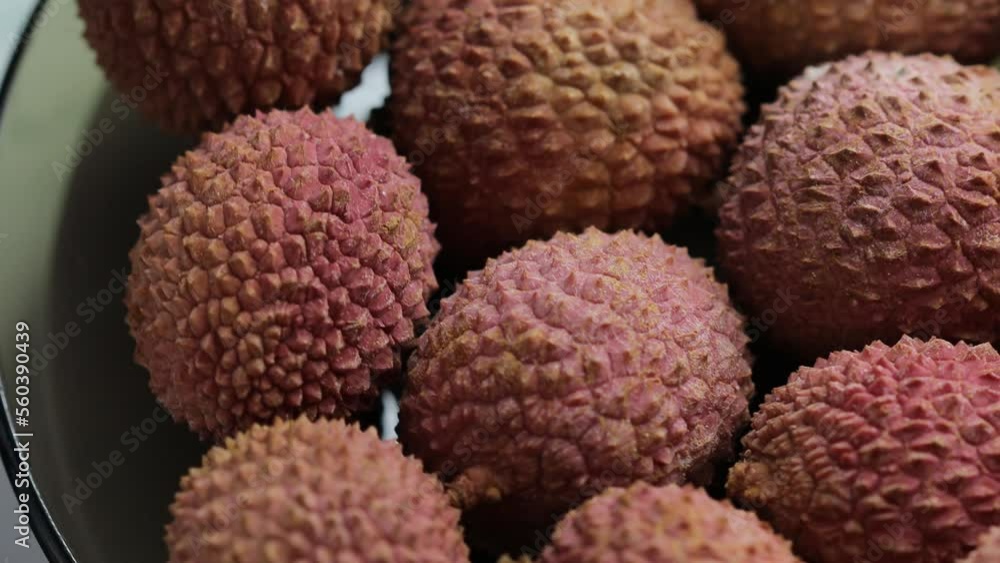Lychee berries spin in circle in plate Lychee berries spin in circle in plate