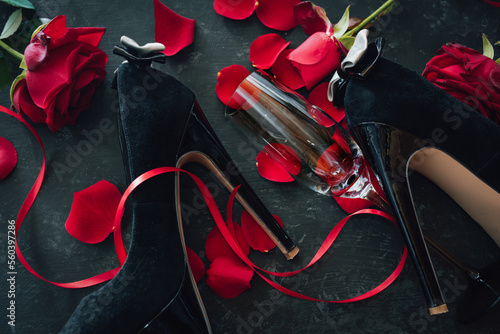 Papier peint Romantic valentines day rendezvous with red roses and black stilettos