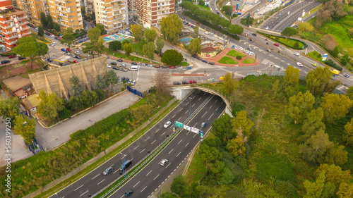 Aerial view of the Fuorigrotta ring road exit in Naples, Italy. At the exit of the highway there is a toll booth for paying the toll.
