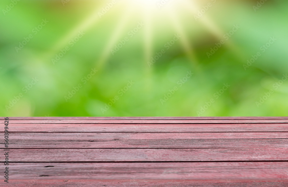 Wooden table on blurred grass field background or garden nature plants inside forest for product background image. Wooden table on blurred grass field background or garden nature plants inside forest for product background image.