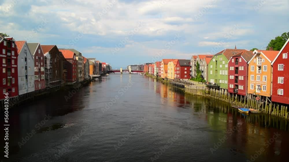 Colorful old houses on stilts on both sides of the Nidelva River, Trondheim old town, Norway Colorful old houses on stilts on both sides of the Nidelva River, Trondheim old town, Norway