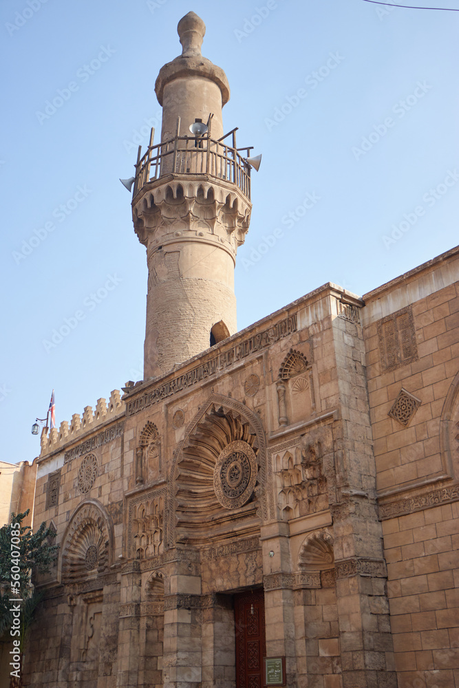 Cairo, Egypt- June 26 2020: Moez Street with few local visitors and Sabil-Kuttab of Katkhuda Mamluk era historic building at the far end during Covid-19 lockdown period, Gamalia district, Old Cairo