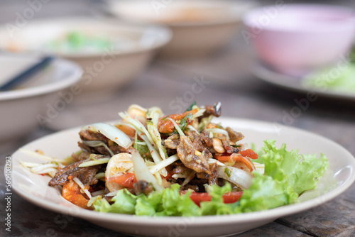 Thai spicy salad on a plate is food for health