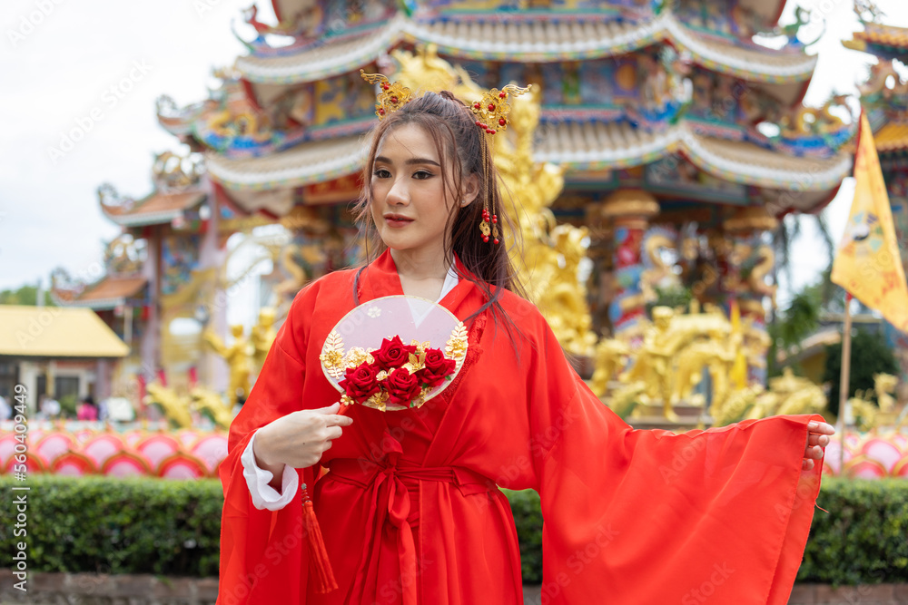 Asian girl wearing Chinese costumes decoration for Chinese new year festival celebrate culture of china