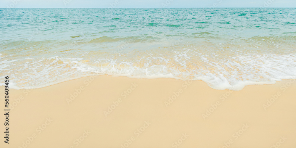 Photos of the beach gently lapped by the waves, photos of the beach in the morning, holidays, relaxation.