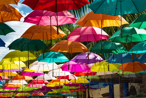 Obraz na płótnie Colorful umbrellas spanning street at Caudan Waterfront shopping center, Port Louis, Mauritius w salonie