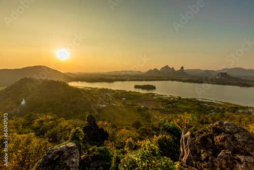The view of the natural background of the mountain close-up, with blurred fog scattered in the rainy season or the humid climate, with beautiful green trees in the ecological system
