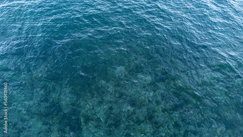 aerial view of sea surface. turquoise water high angle view. © Mete Caner Arican