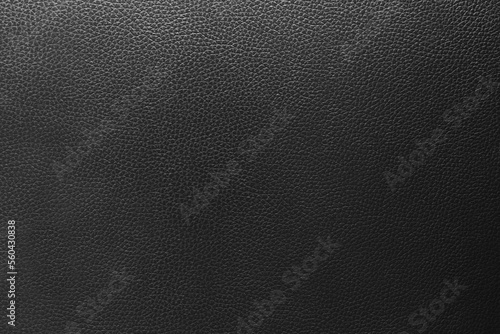 Black leather and a textured background.