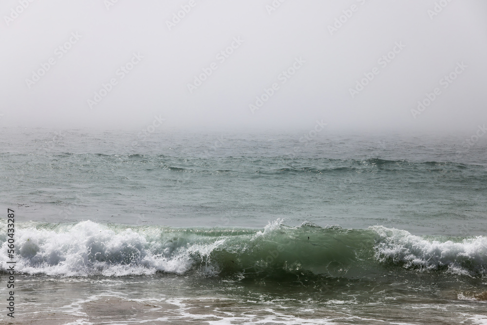 Ocean waves in a morning mist