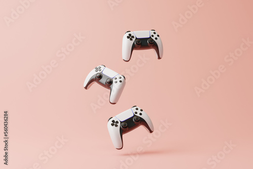 Flying gamepad on a pink background with copy space. Joystick for video game. Game controller. Creative Minimal Gaming concept. Front view. 3D rendering illustration