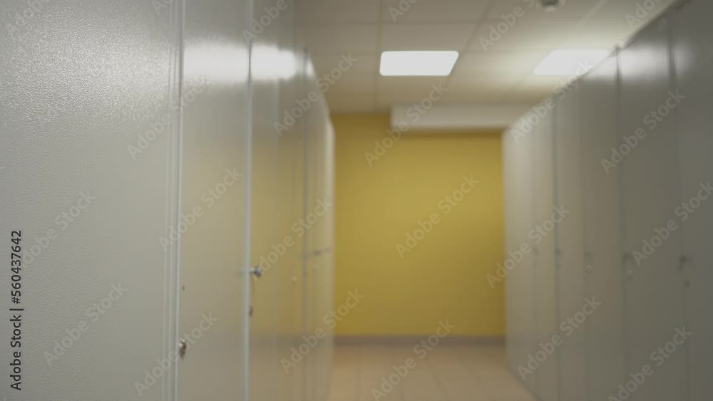 A man closes the box door with blue protective hospital gloves. High-quality shooting in 4k format A man closes the box door with blue protective hospital gloves. High-quality shooting in 4k format