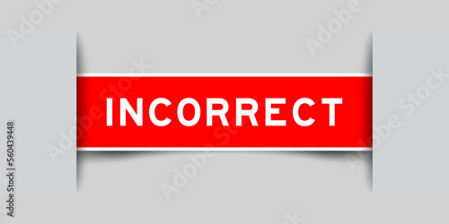 Green color square label sticker with word incorrect that inserted in gray background