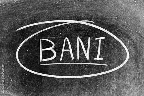 Bilde på lerret White chalk hand writing in word BANI (Brittle, Anxious, Non-linear and Incompre