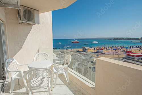 Terrace balcony with chairs in tropical luxury apartment resort