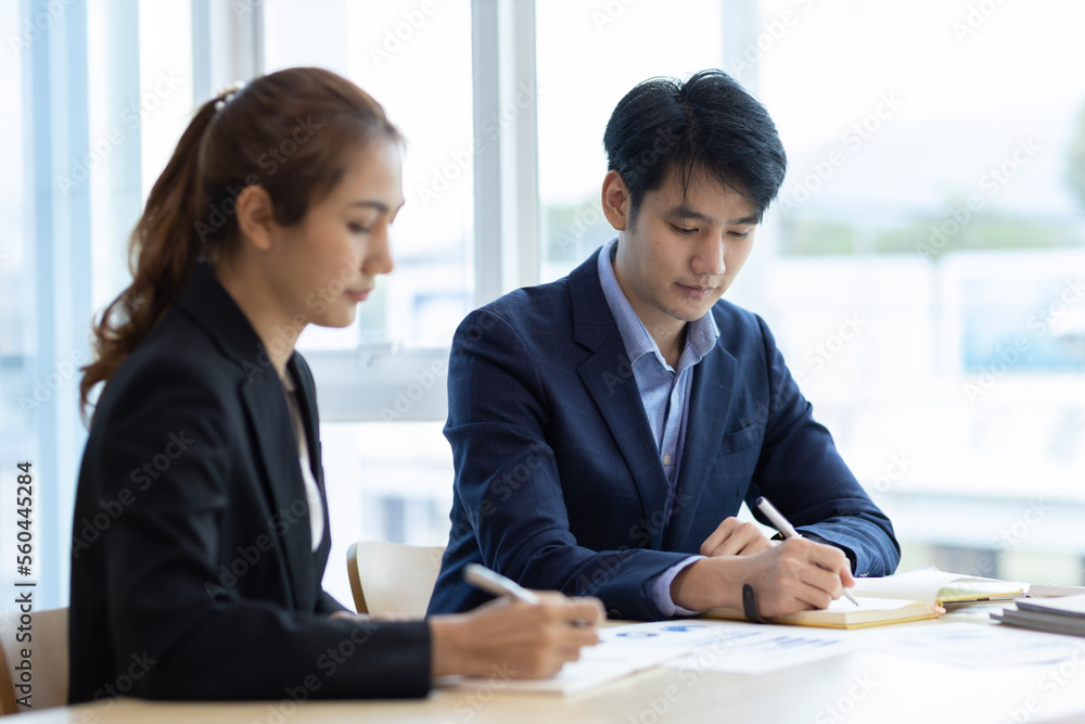 Colleagues meeting to discuss project planning and market research for business profit growth. Collaboration of people in the organization. Colleagues meeting to discuss project planning and market research for business profit growth. Collaboration of people in the organization.