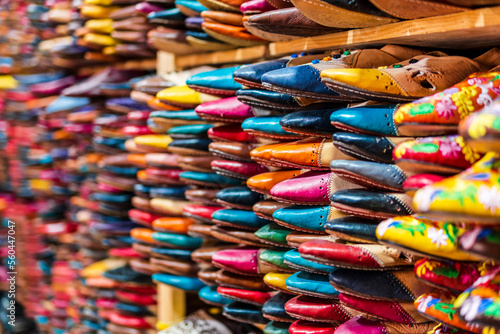 Colorful handmade leather slippers waiting for clients at shop in Fes, next to tanneries, Morocco, Africa © malajscy